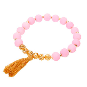 Pulsera Rosa Con Bola De Filigrana Oro Y Borla